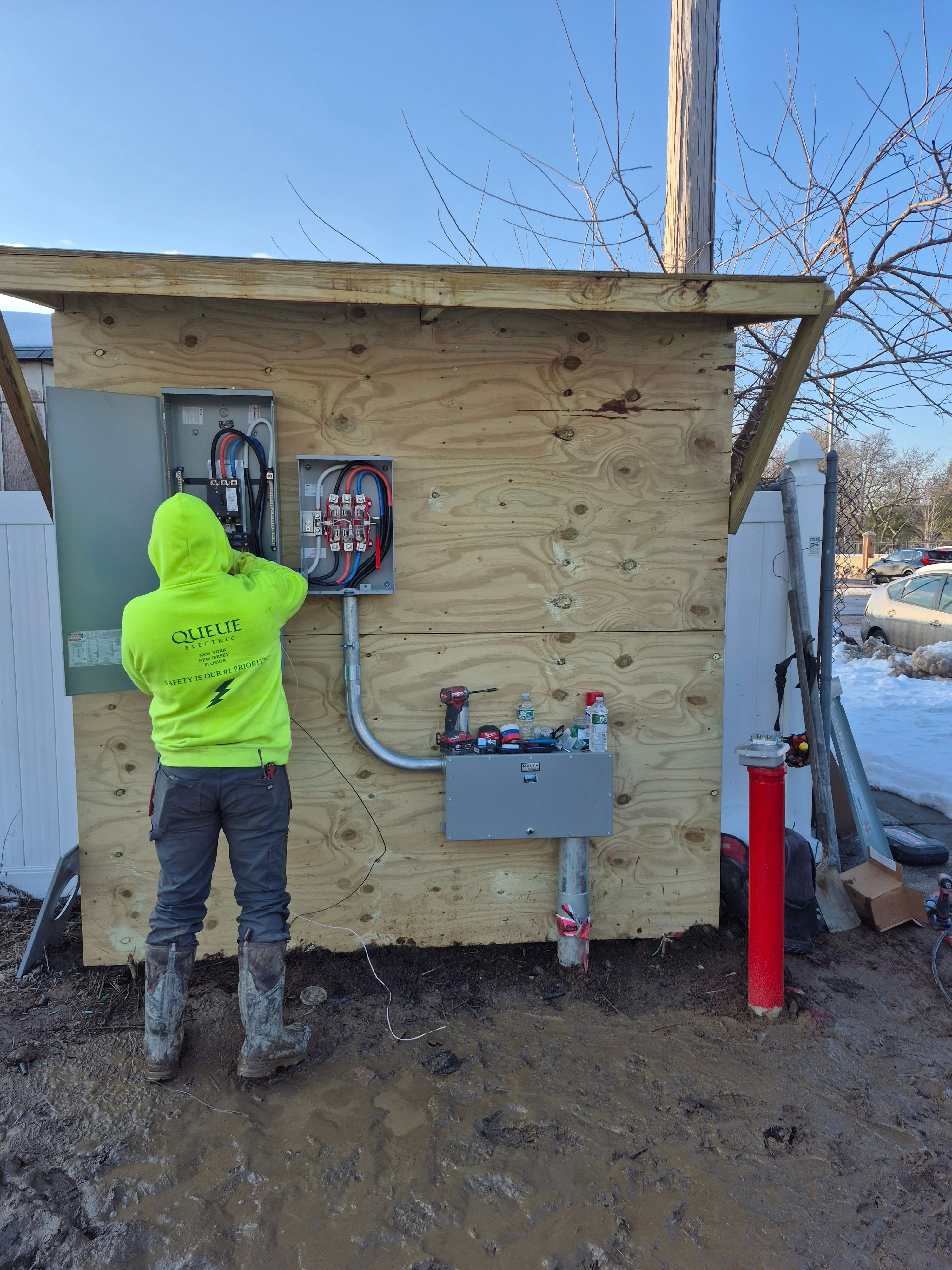 Electrical contractor workspace with tools and equipment ready for service calls.